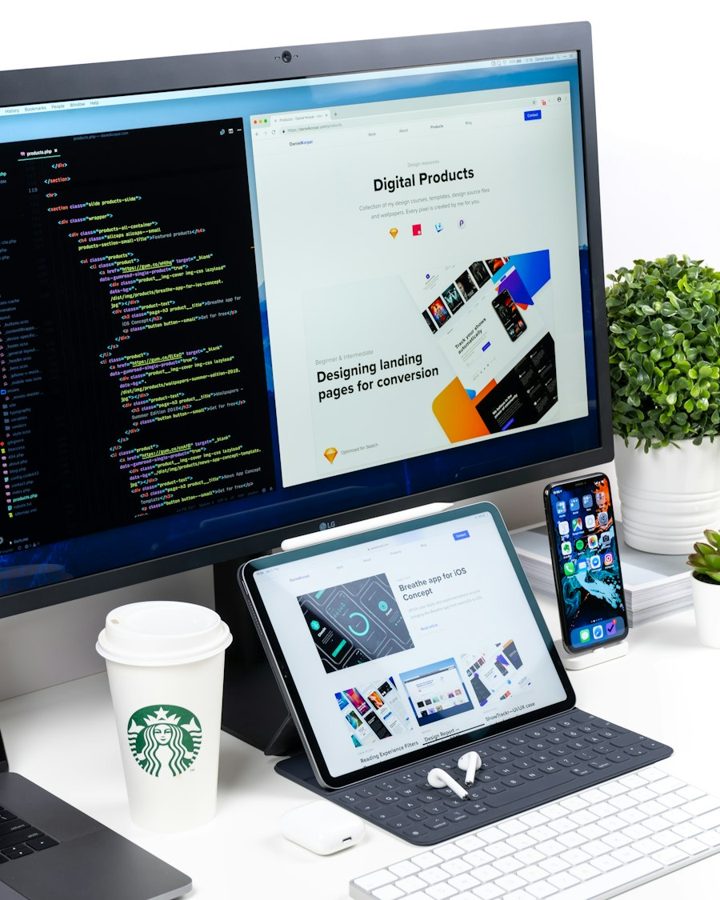 Website displayed on a Mac, iPad and iPhone